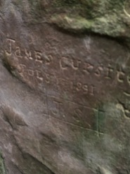 Old graffiti inside the cairn. :-\
